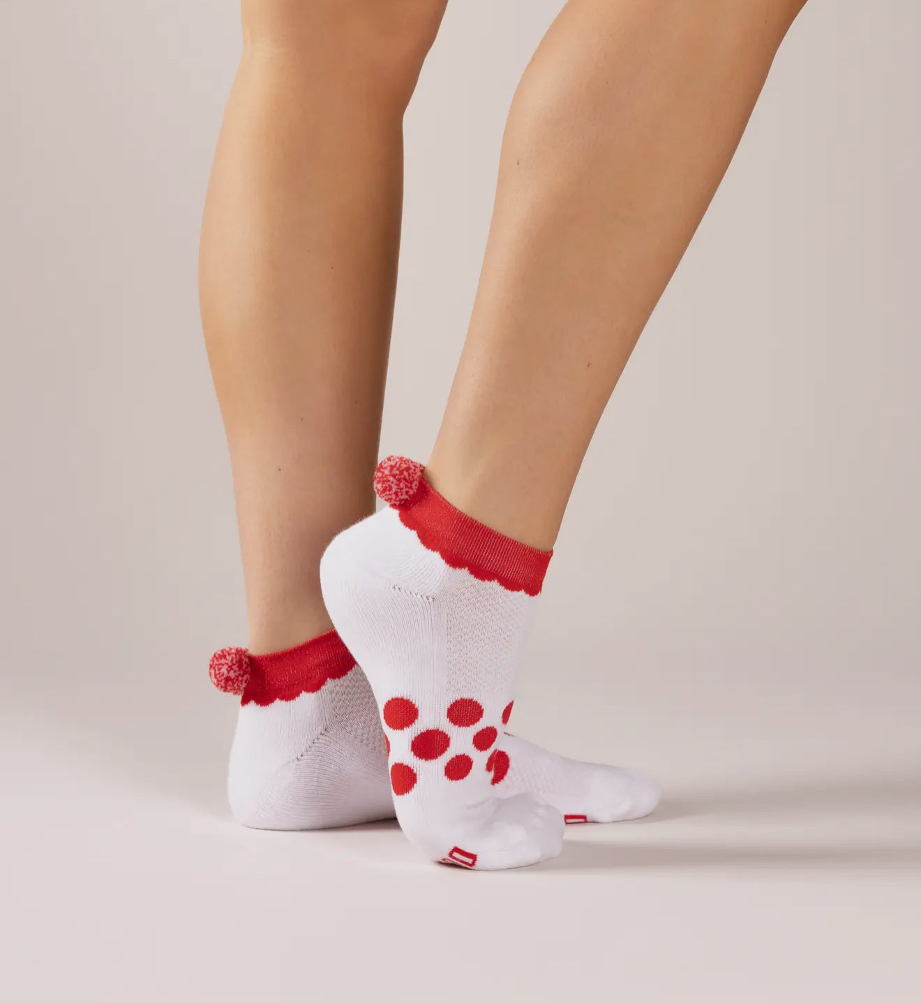 Ankle socks with red trim and Pom Poms